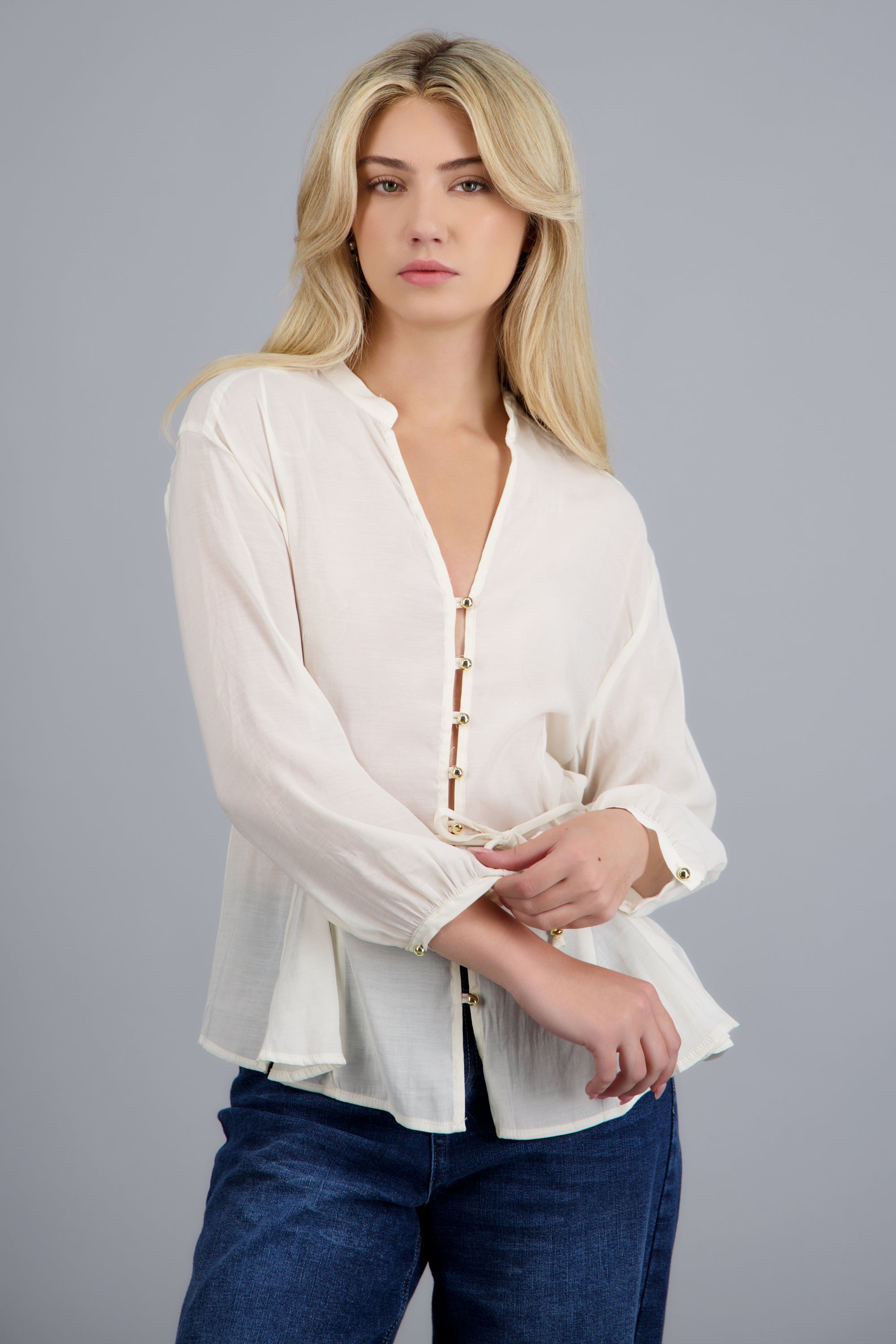 Blusa fluida detalle cituron manga larga CREMA