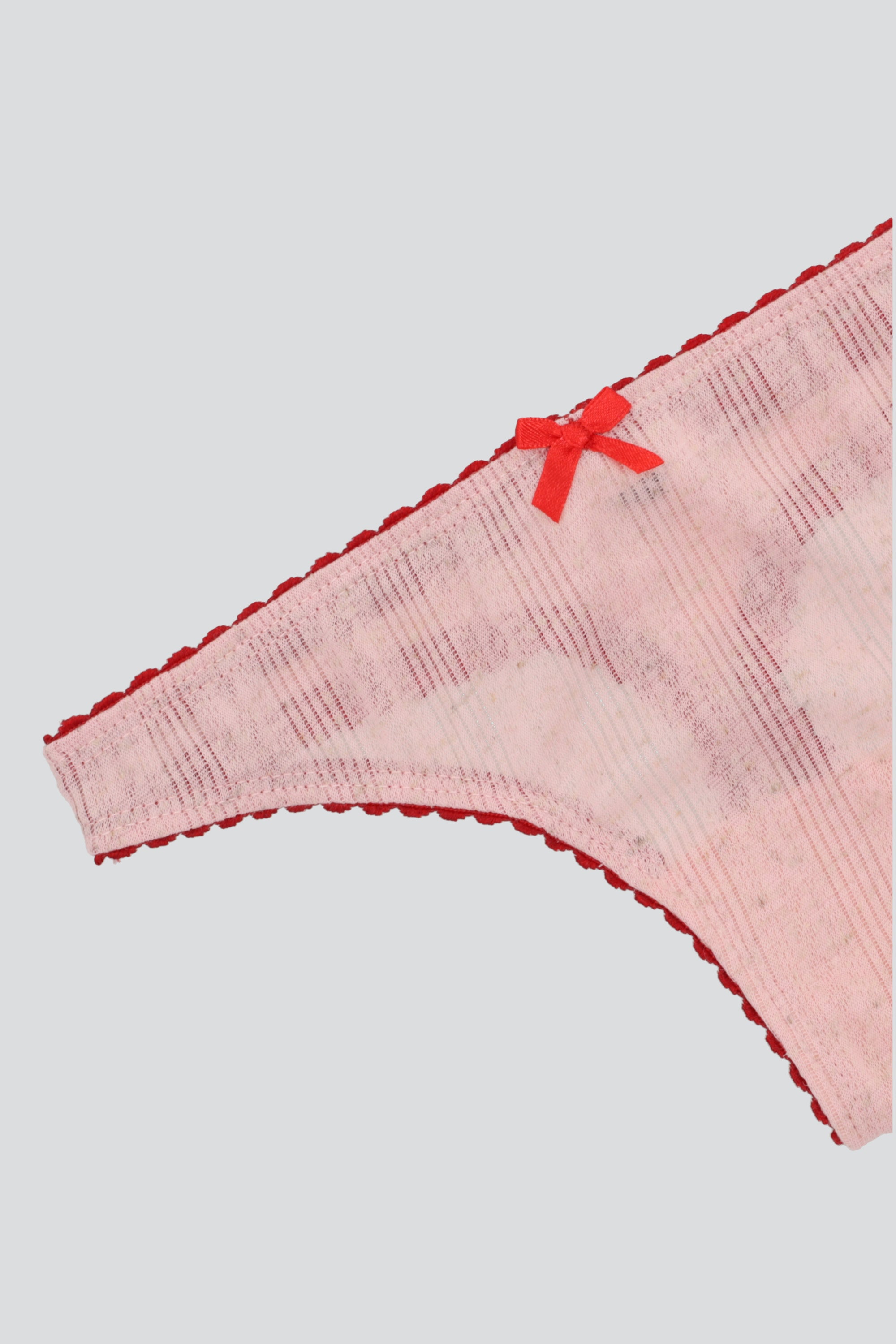 Tanga detalle tela rombos contraste ROSA