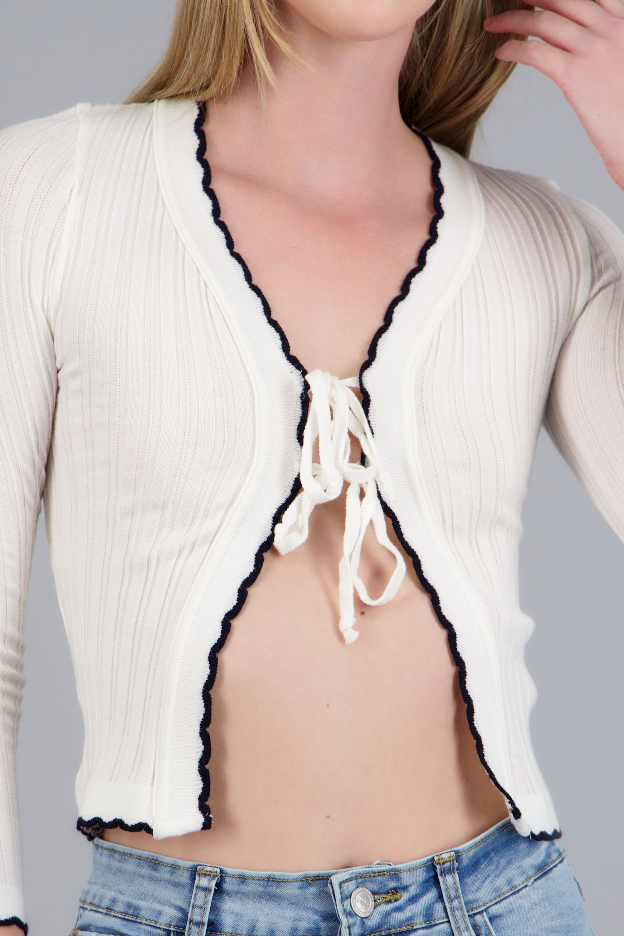 Cardigan detalle ondas contraste HUESO