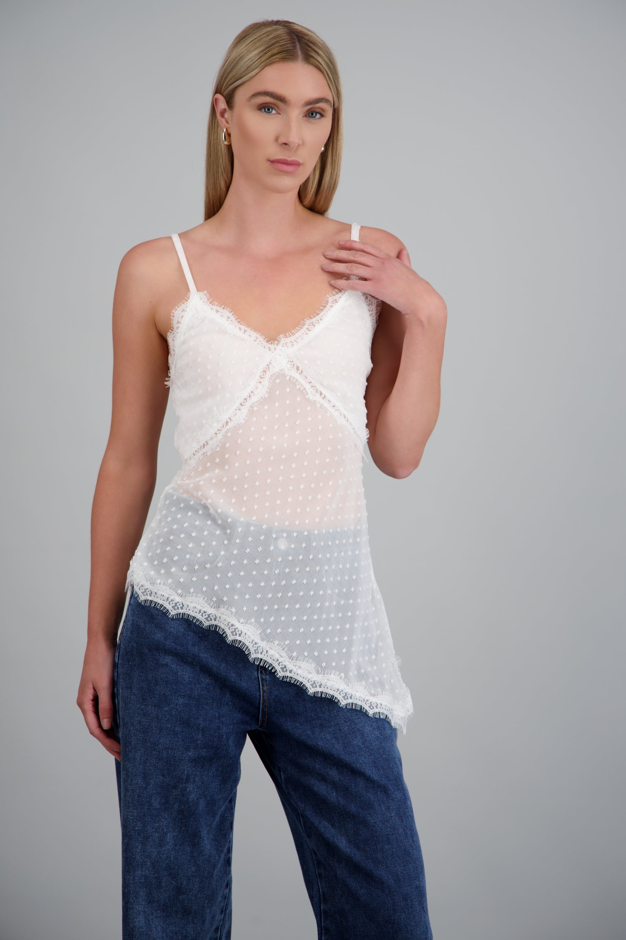 Blusa asimetrica detalle puntos BLANCO