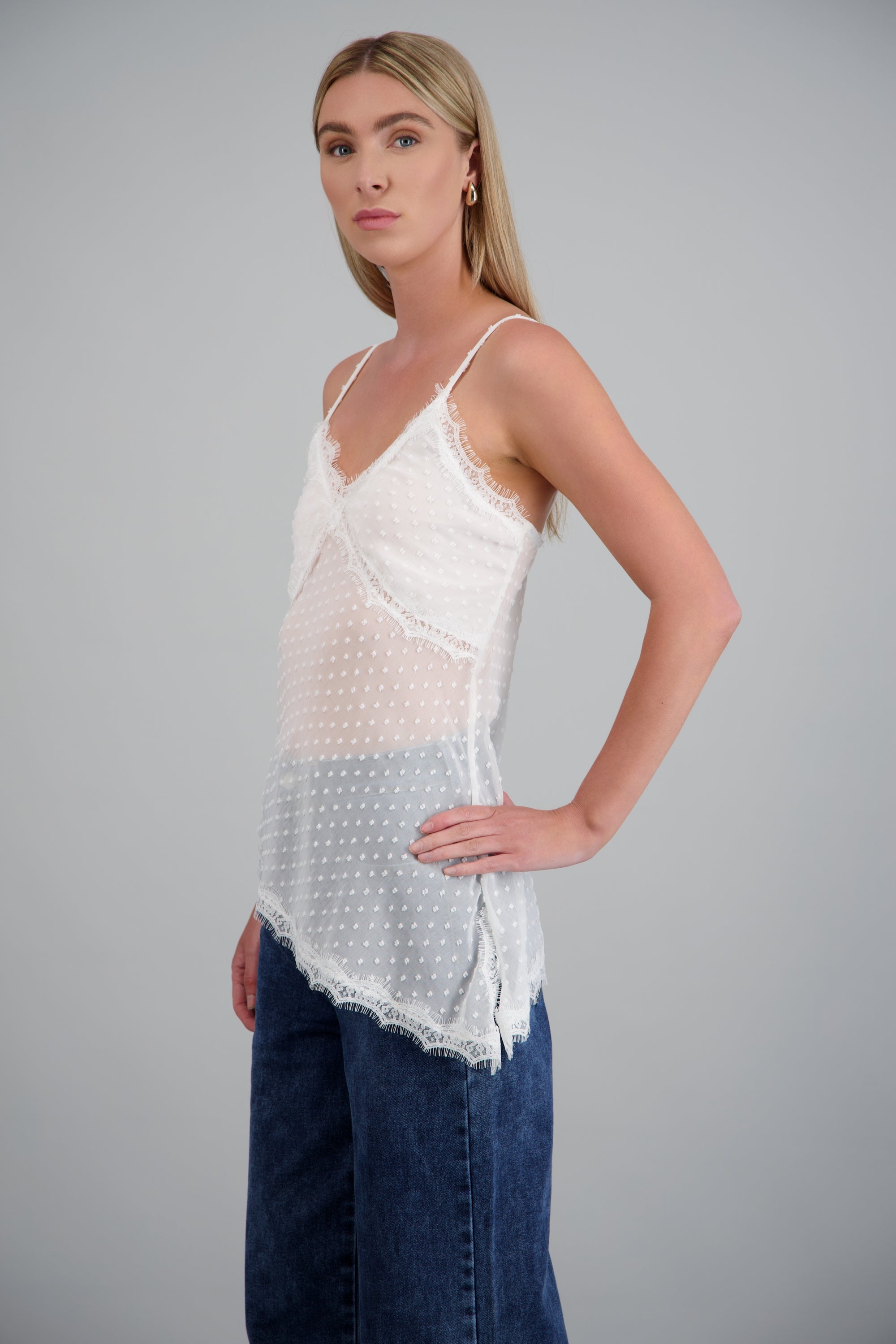 Blusa asimetrica detalle puntos BLANCO