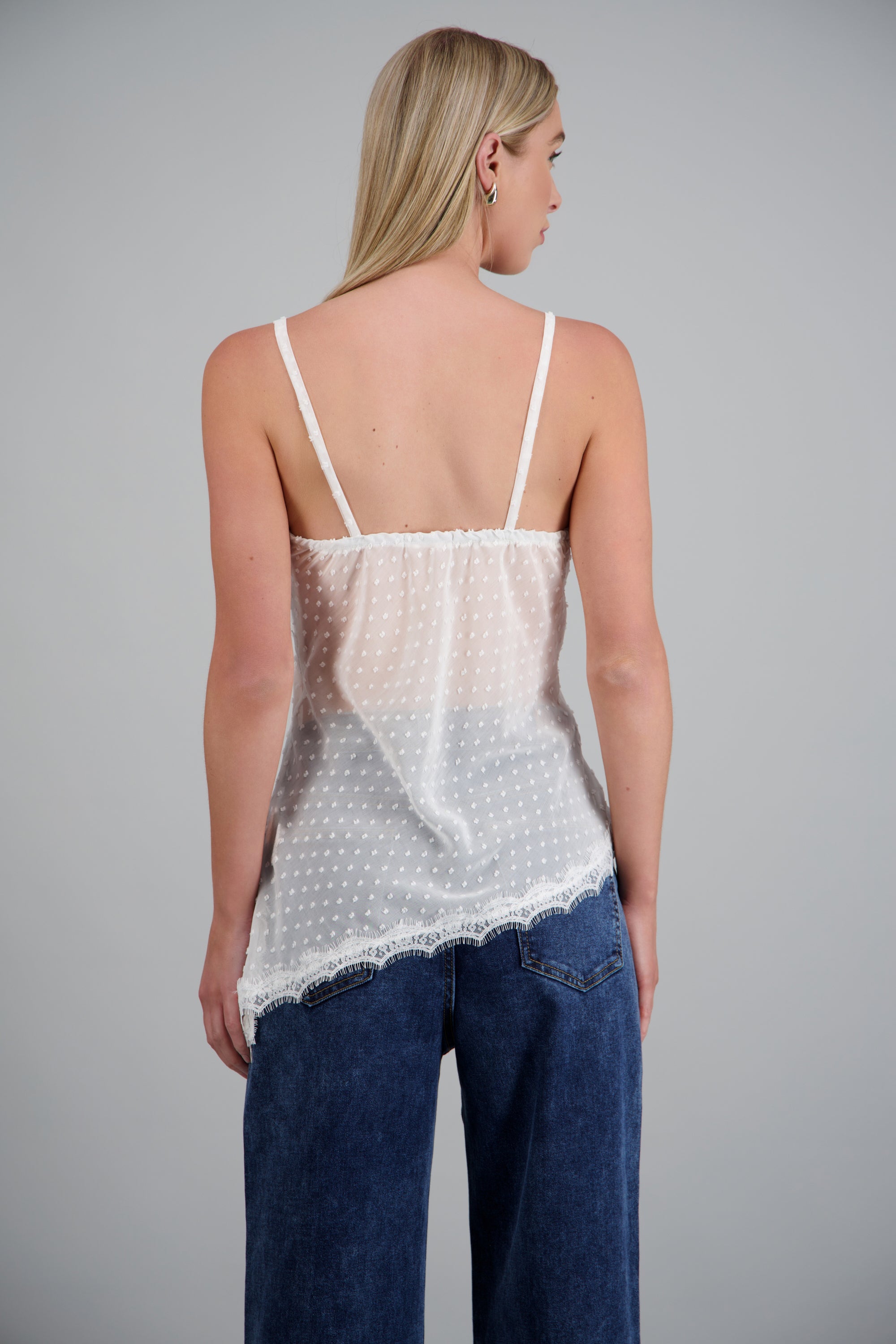 Blusa asimetrica detalle puntos BLANCO