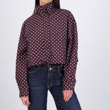 Chamarra ligera polkadots con cuello alto