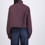 Chamarra ligera polkadots con cuello alto
