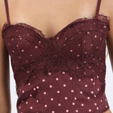 Top corset con encaje y estampado polka dots