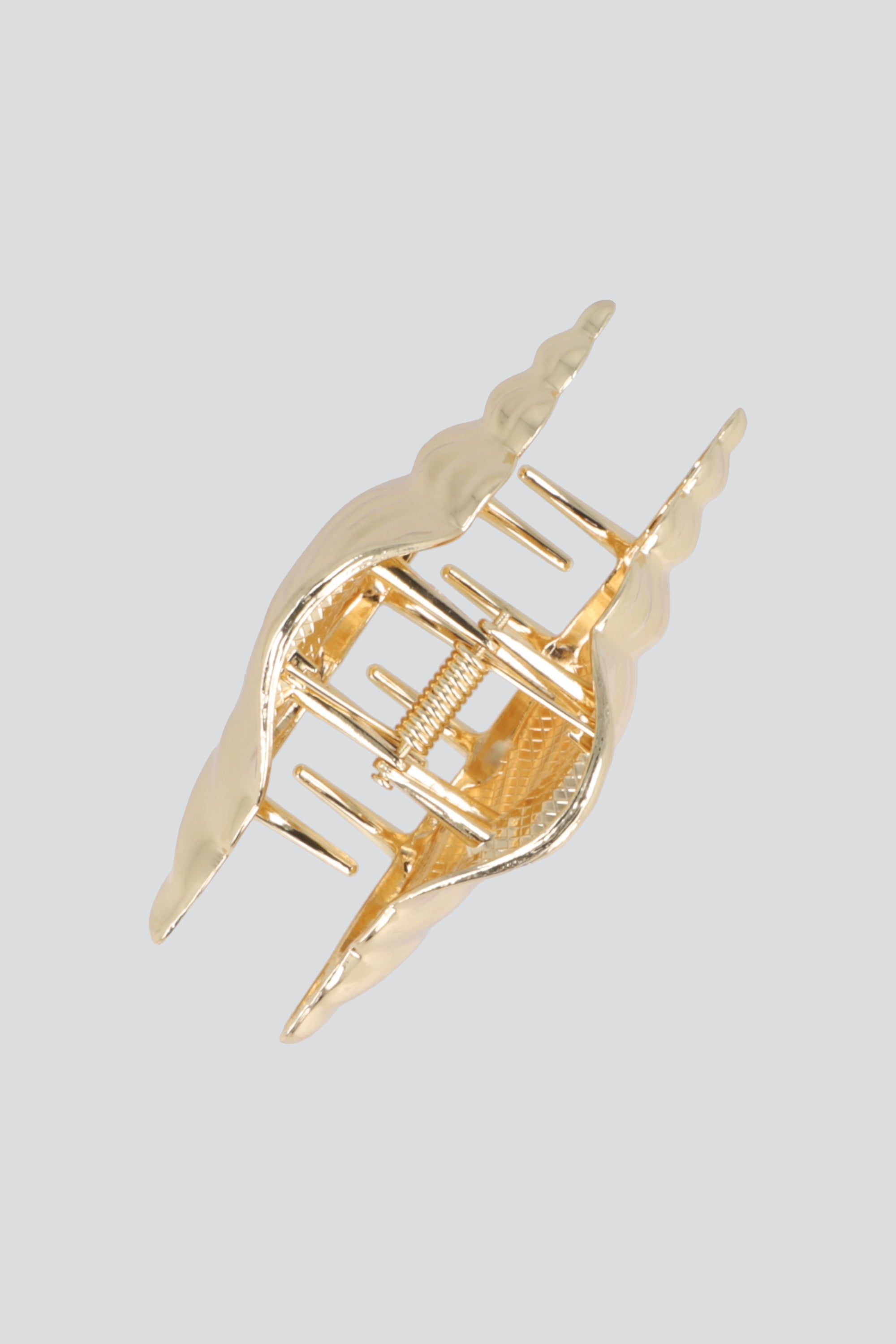 PINZA CARACOLA METALICA ORO