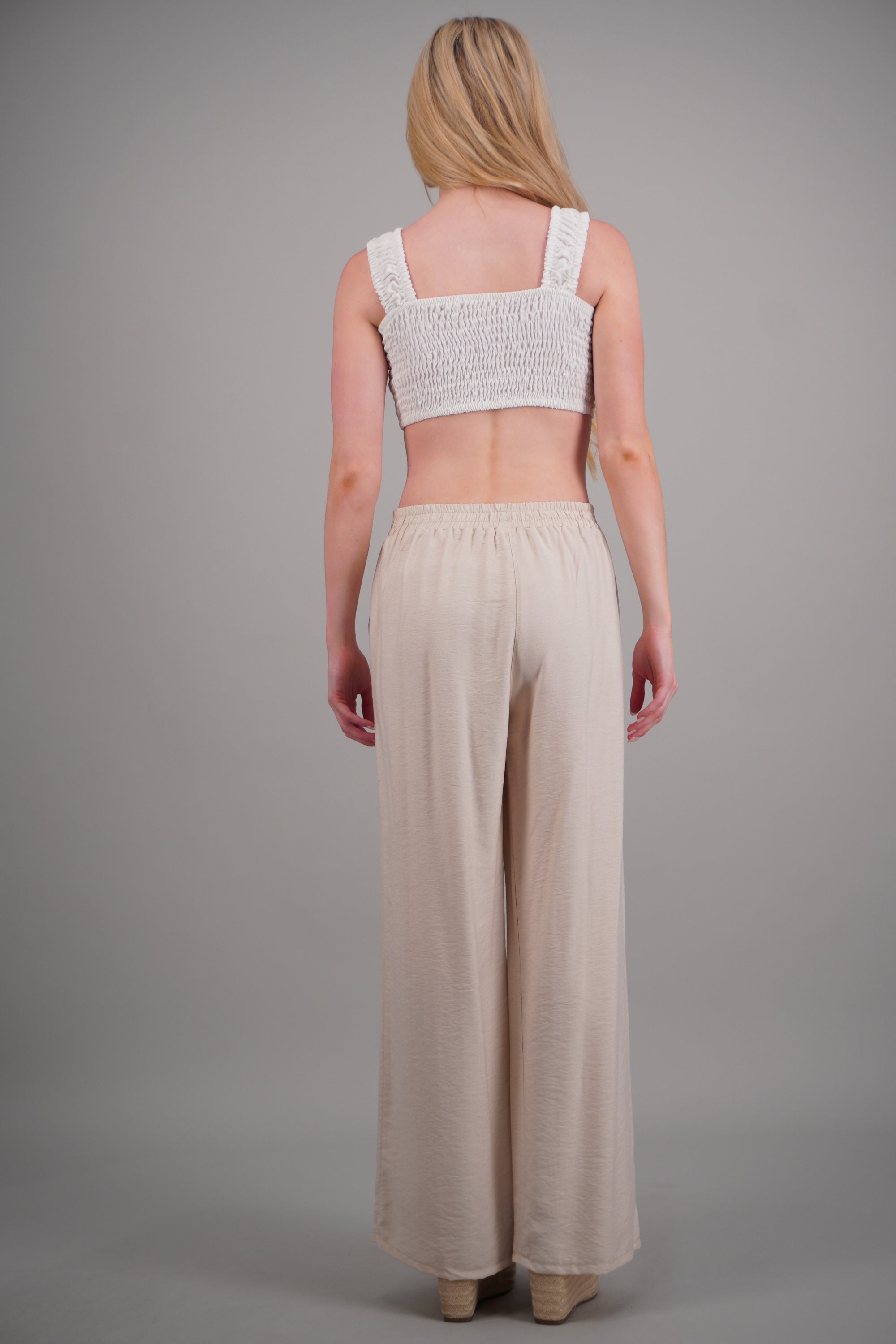 Pantalon amplio liso con resorte CREMA