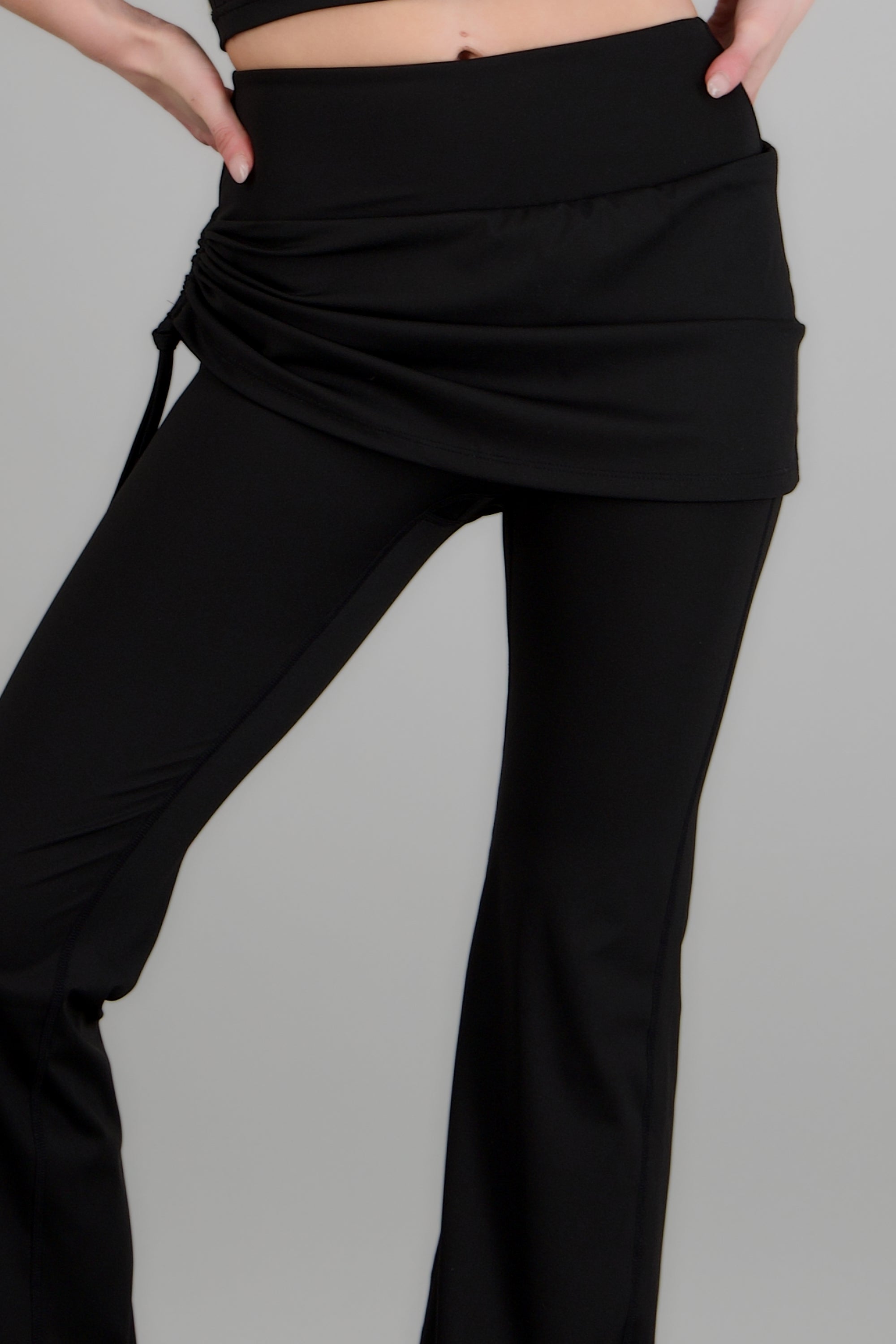 Leggings flare con falda NEGRO