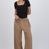 Pantalones mini cuadros pierna amplia