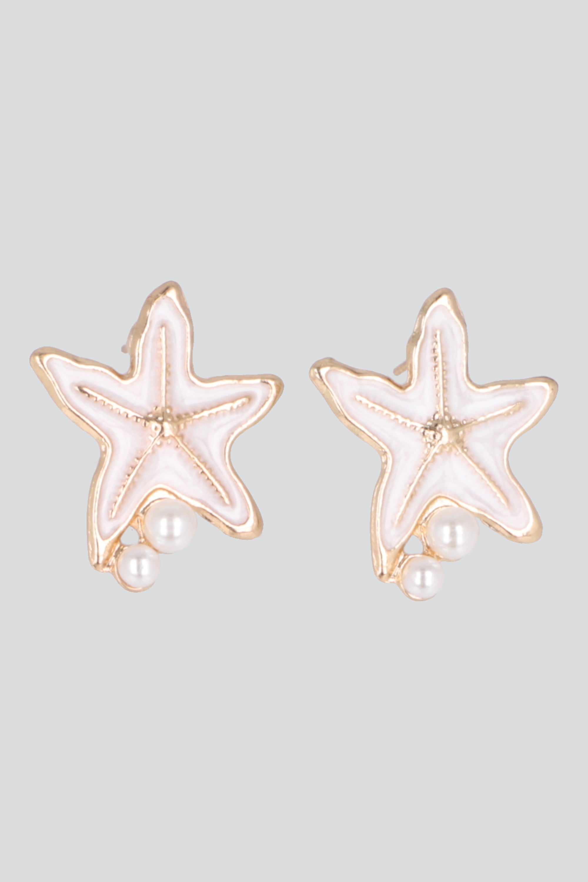 ARETES ESTRELLA DE MAR PERLA HUESO