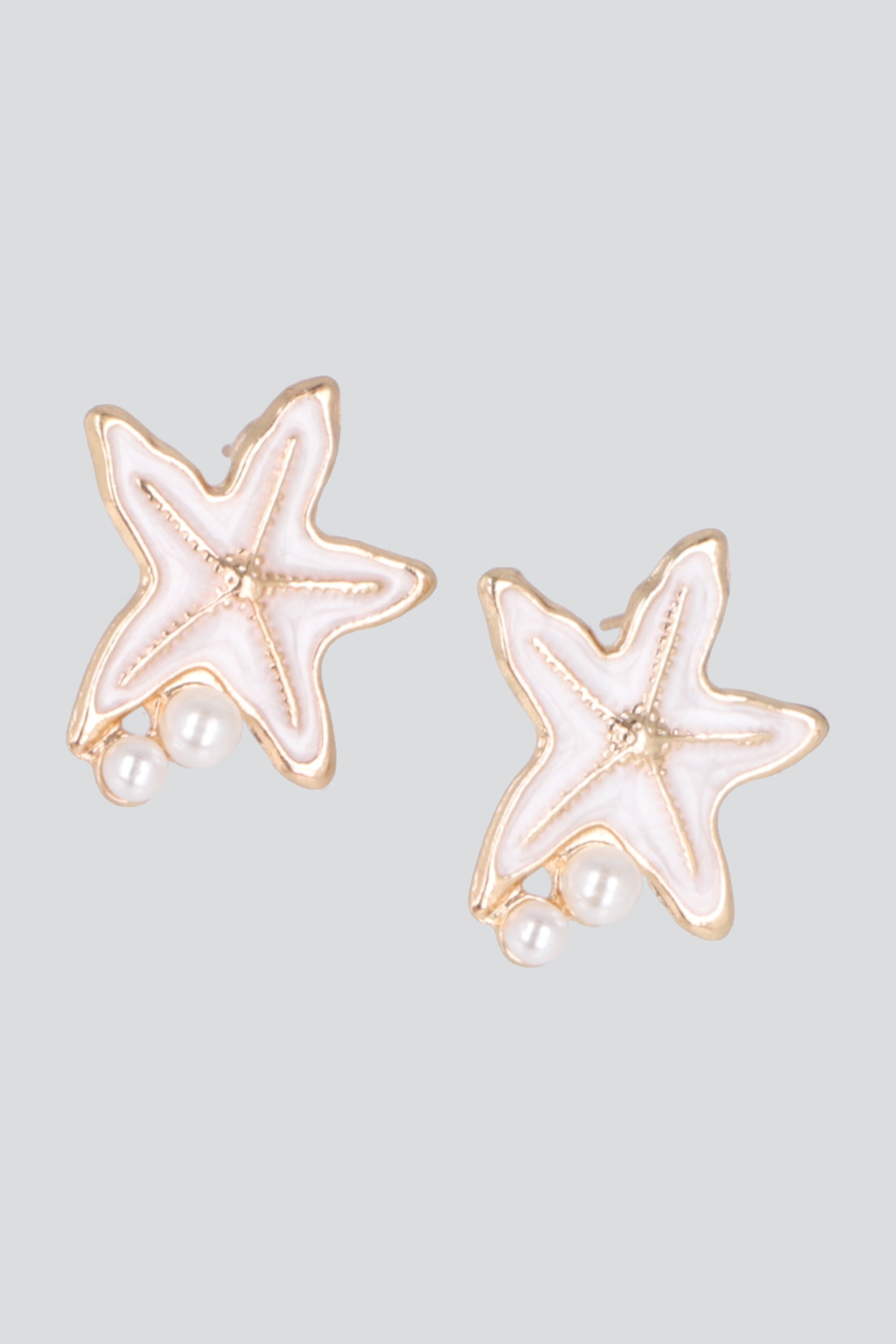 ARETES ESTRELLA DE MAR PERLA HUESO