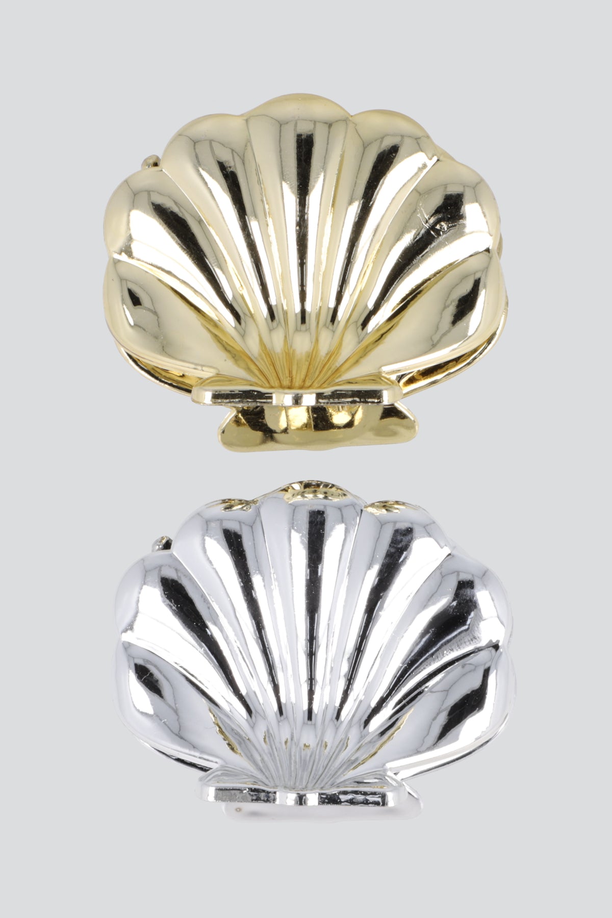 Set 2 pinzas concha metal ORO