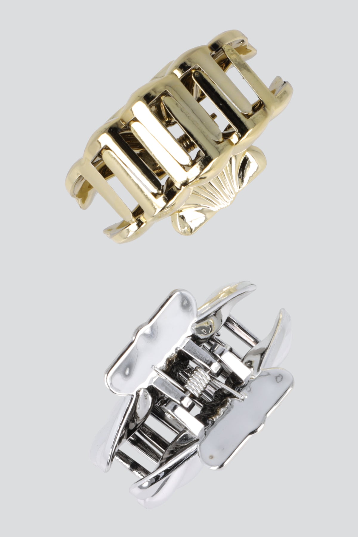 Set 2 pinzas concha metal ORO