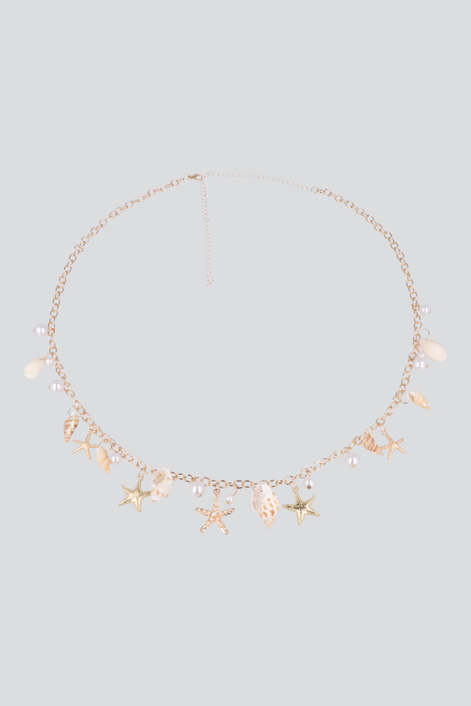 CINTURON CHARMS CONCHAS ORO