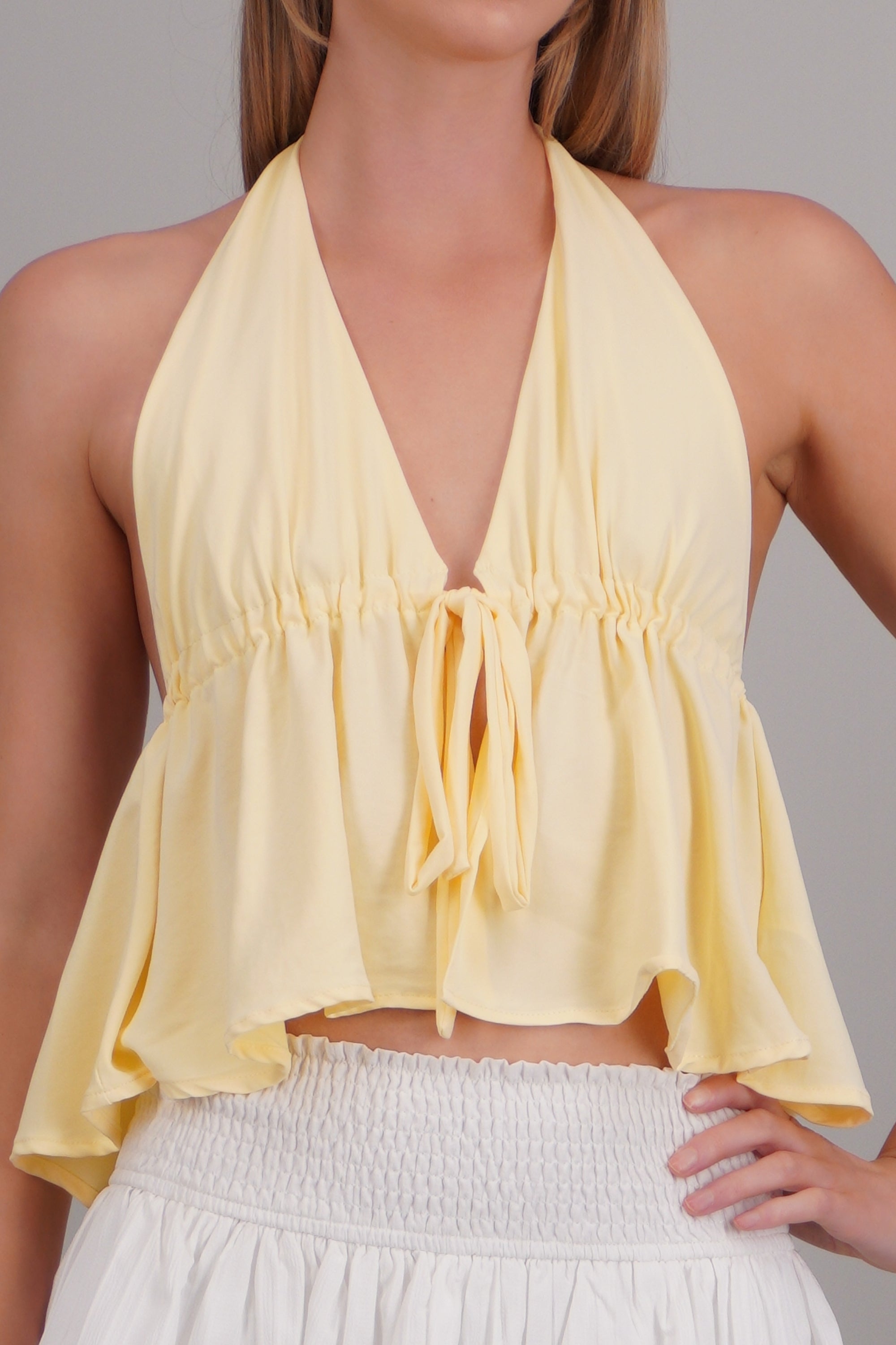 Top sin mangas detalle amarre en cintura AMARILLO PASTEL