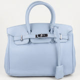 Bolso de mano broche