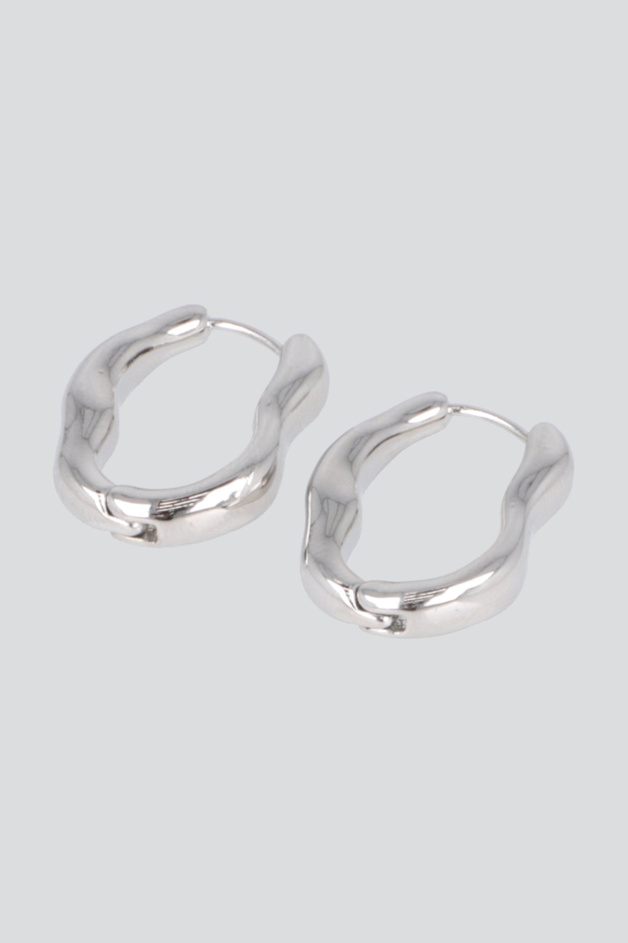 ARRACADAS SILUETA IRREGULAR PLATA