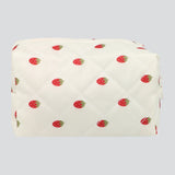 Cosmetiquera capitonada fresas