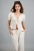 Top detalle mangas bubble textura