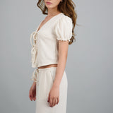 Top detalle mangas bubble textura