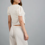 Top detalle mangas bubble textura