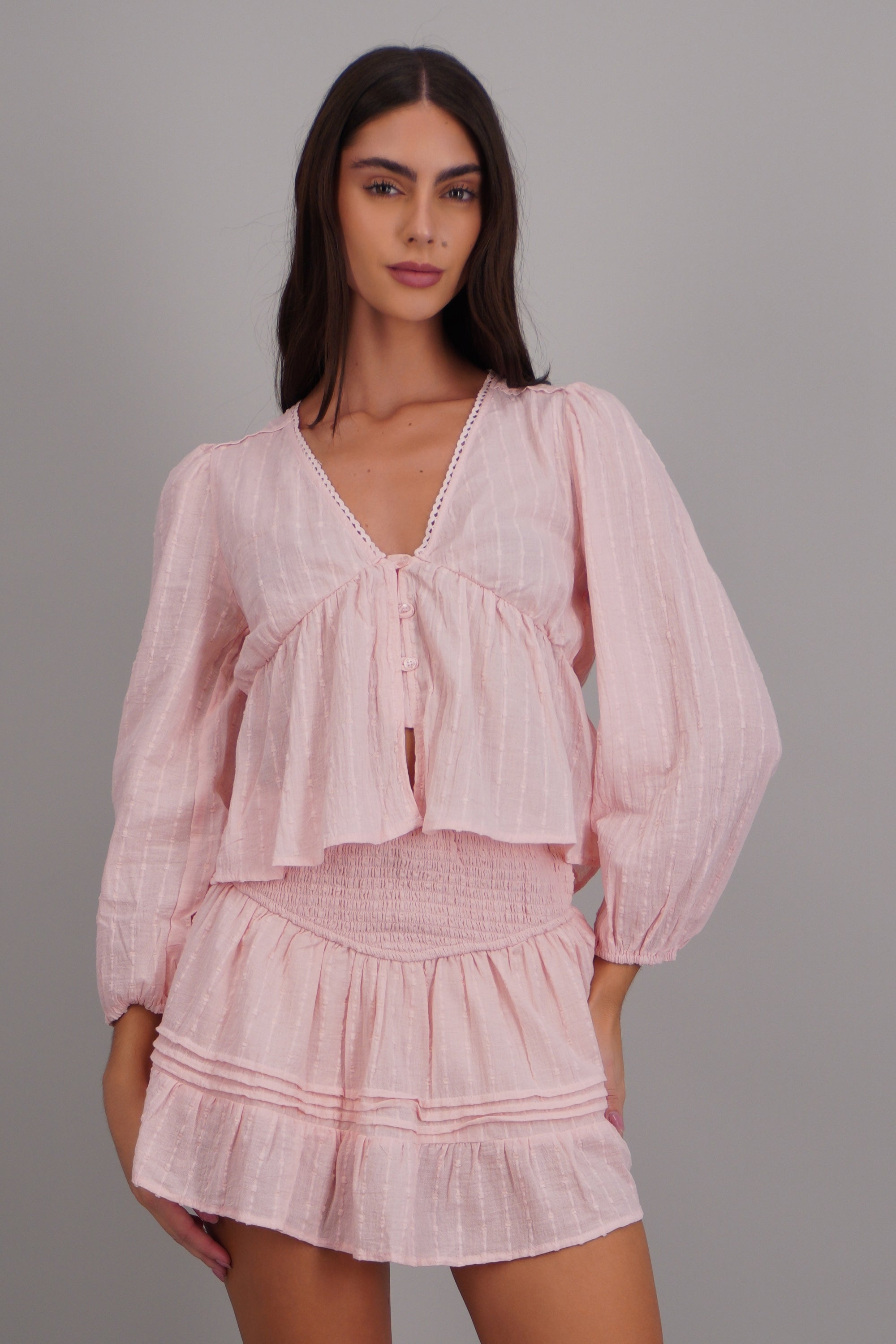 blusa ligera efecto peplum ROSA PASTEL