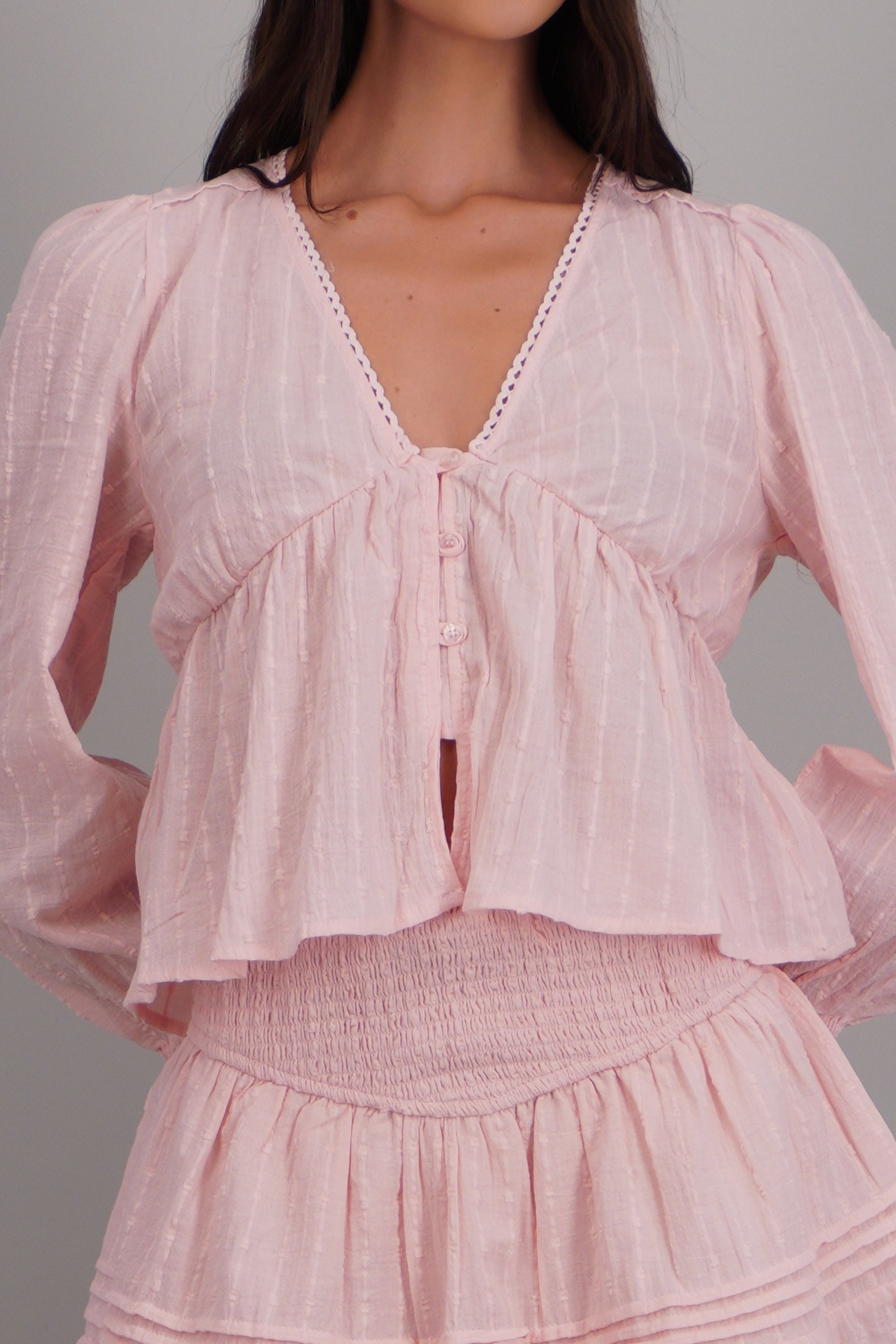 blusa ligera efecto peplum ROSA PASTEL