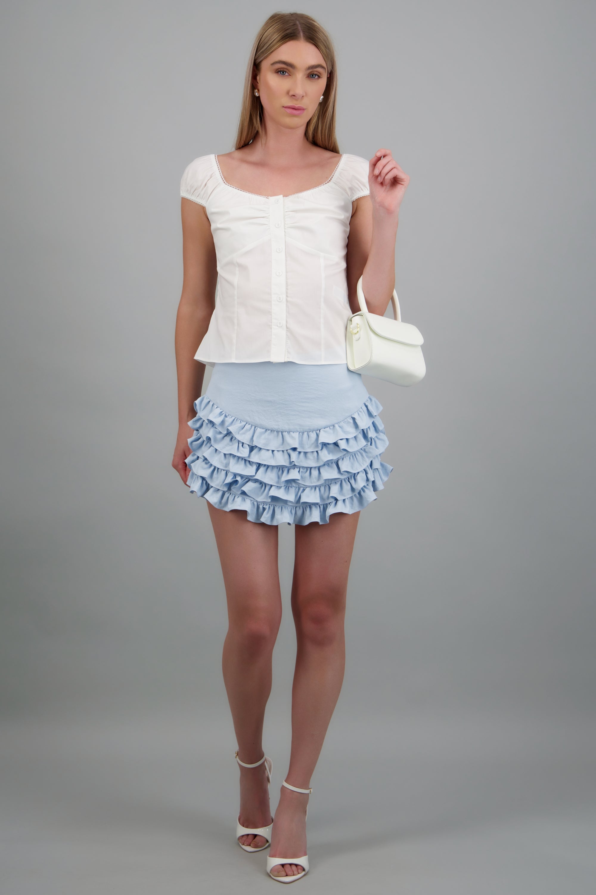 Falda short olanes detalle contraste AZUL PASTEL