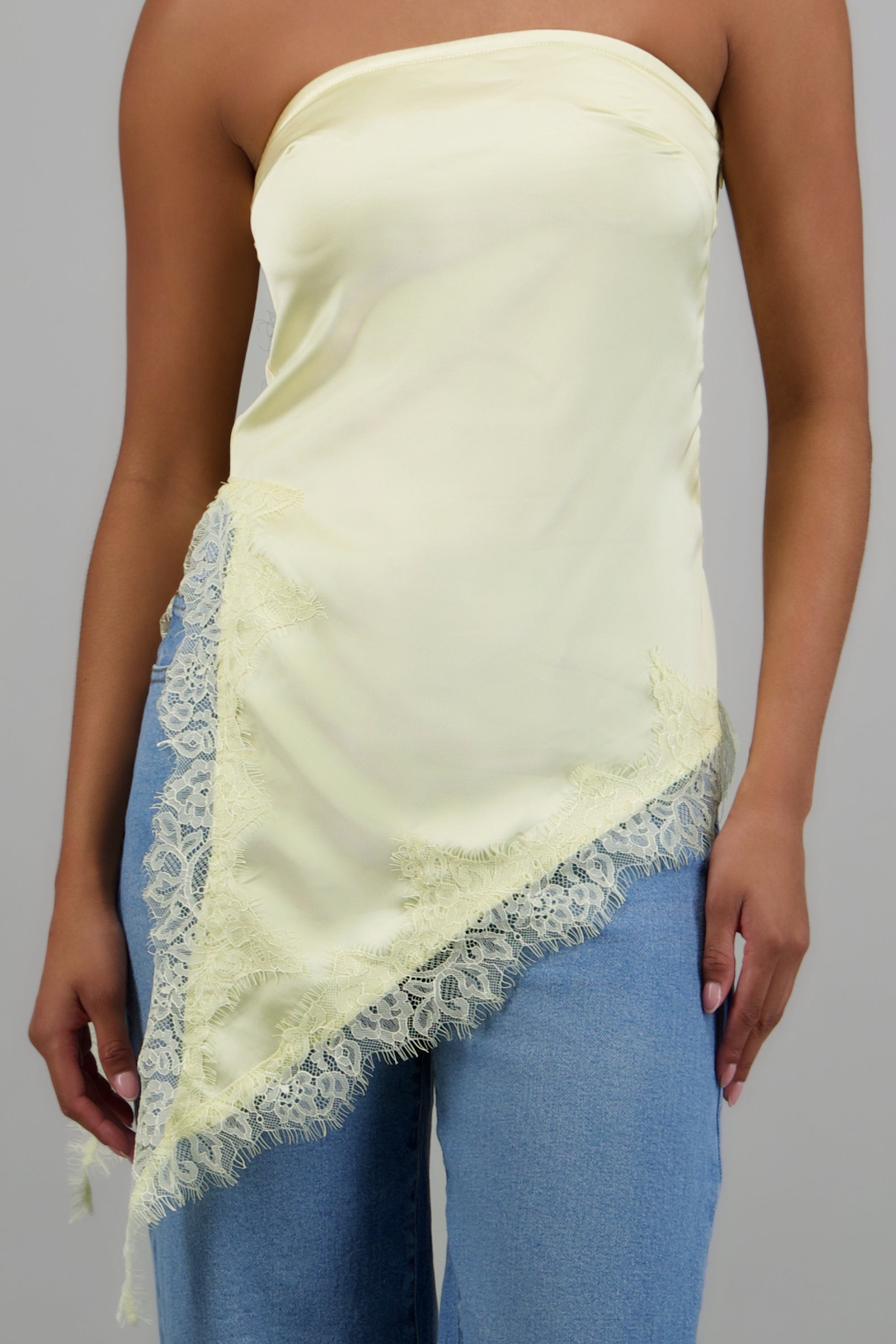 Blusa asimetrica lisa AMARILLO PASTEL