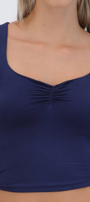 Top sin mangas detalle escote