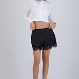 Shorts de satin con encaje