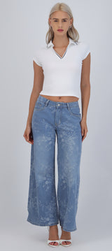 Jeans wide leg detalle flores bordadas