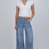 Jeans wide leg detalle flores bordadas