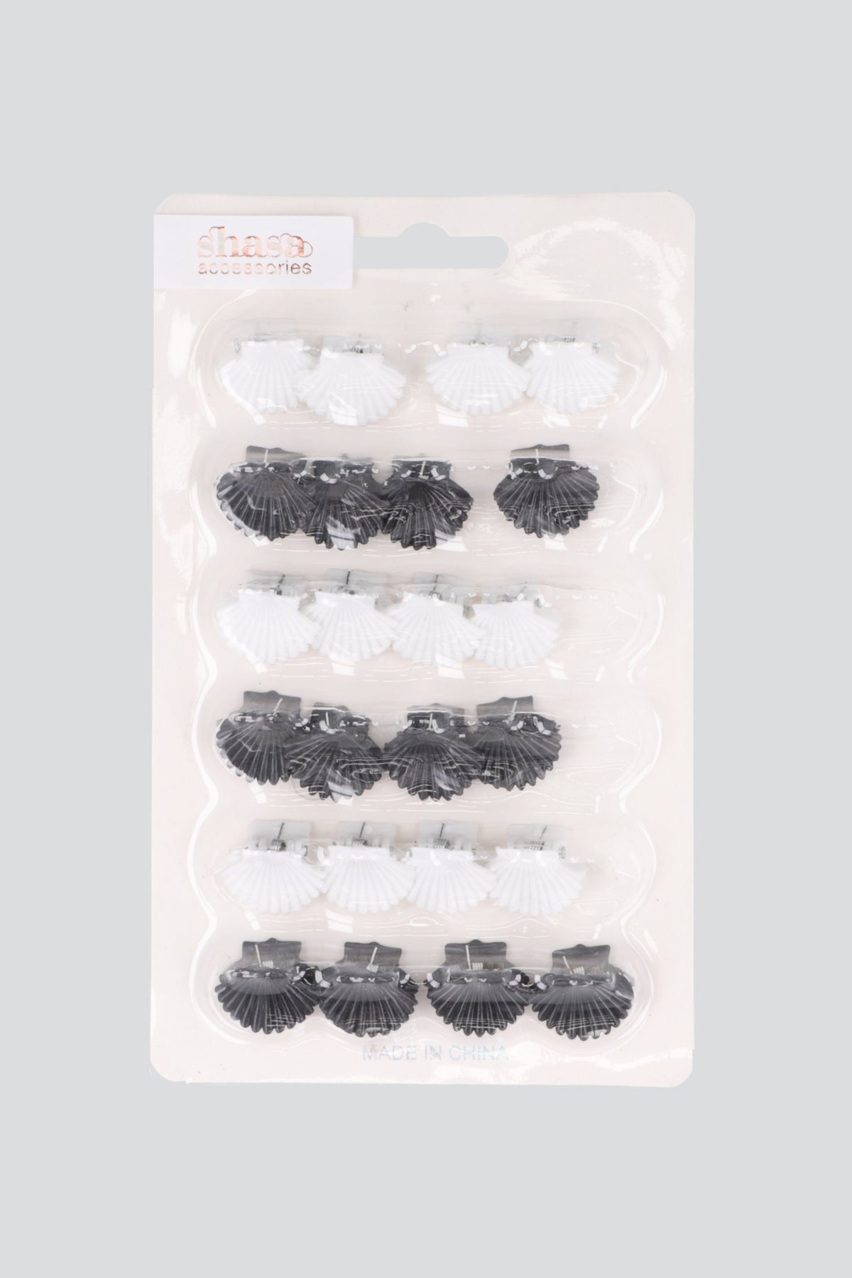 12 pares pinzitas conchas NEGRO BLANCO