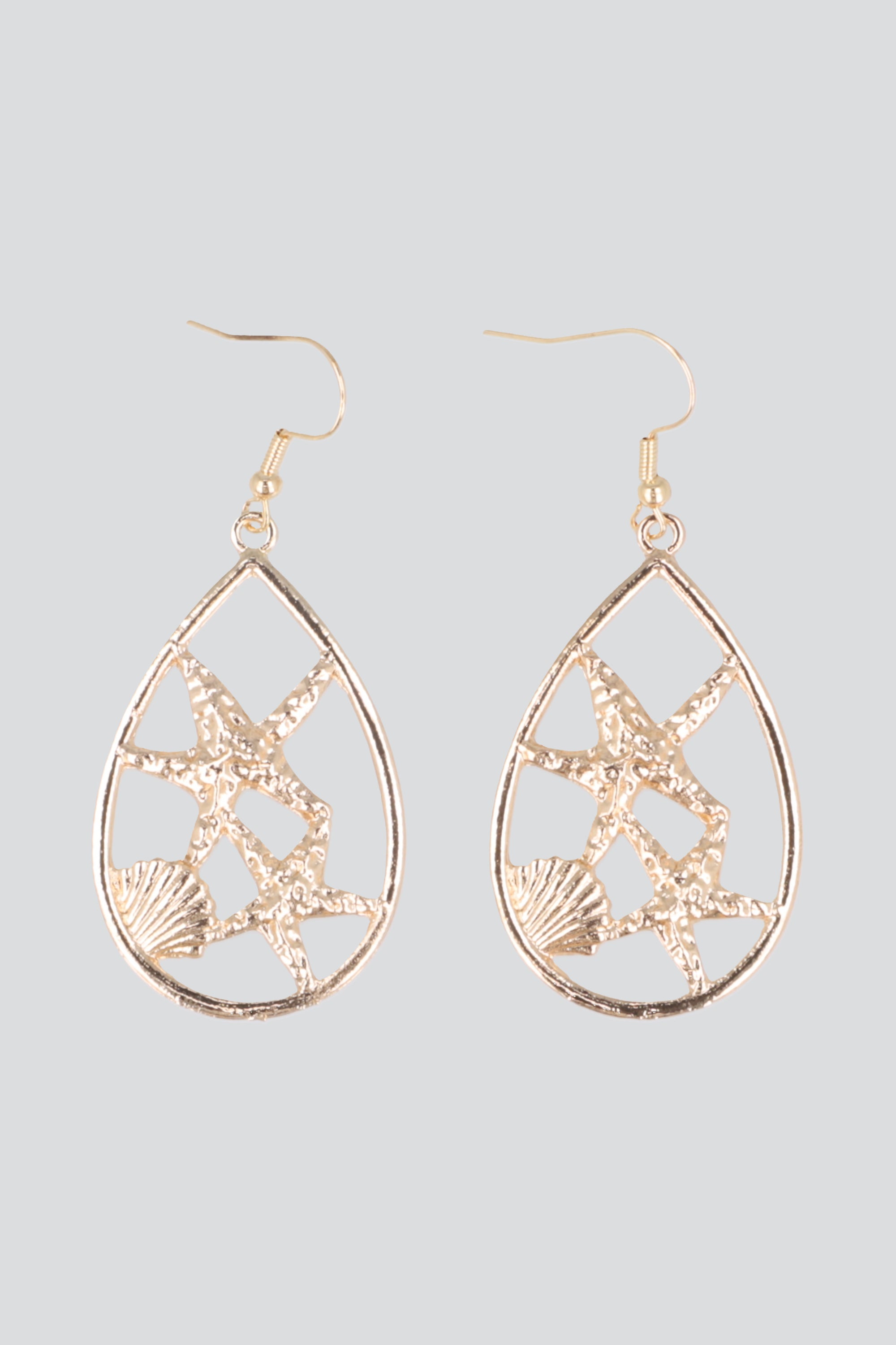 Aretes ovalo estrellas de mar ORO