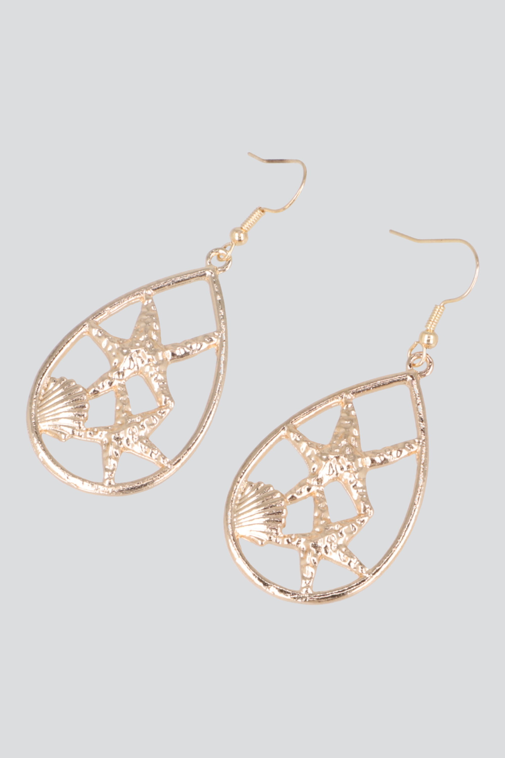Aretes ovalo estrellas de mar ORO