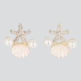 Aretes estrella concha perlas