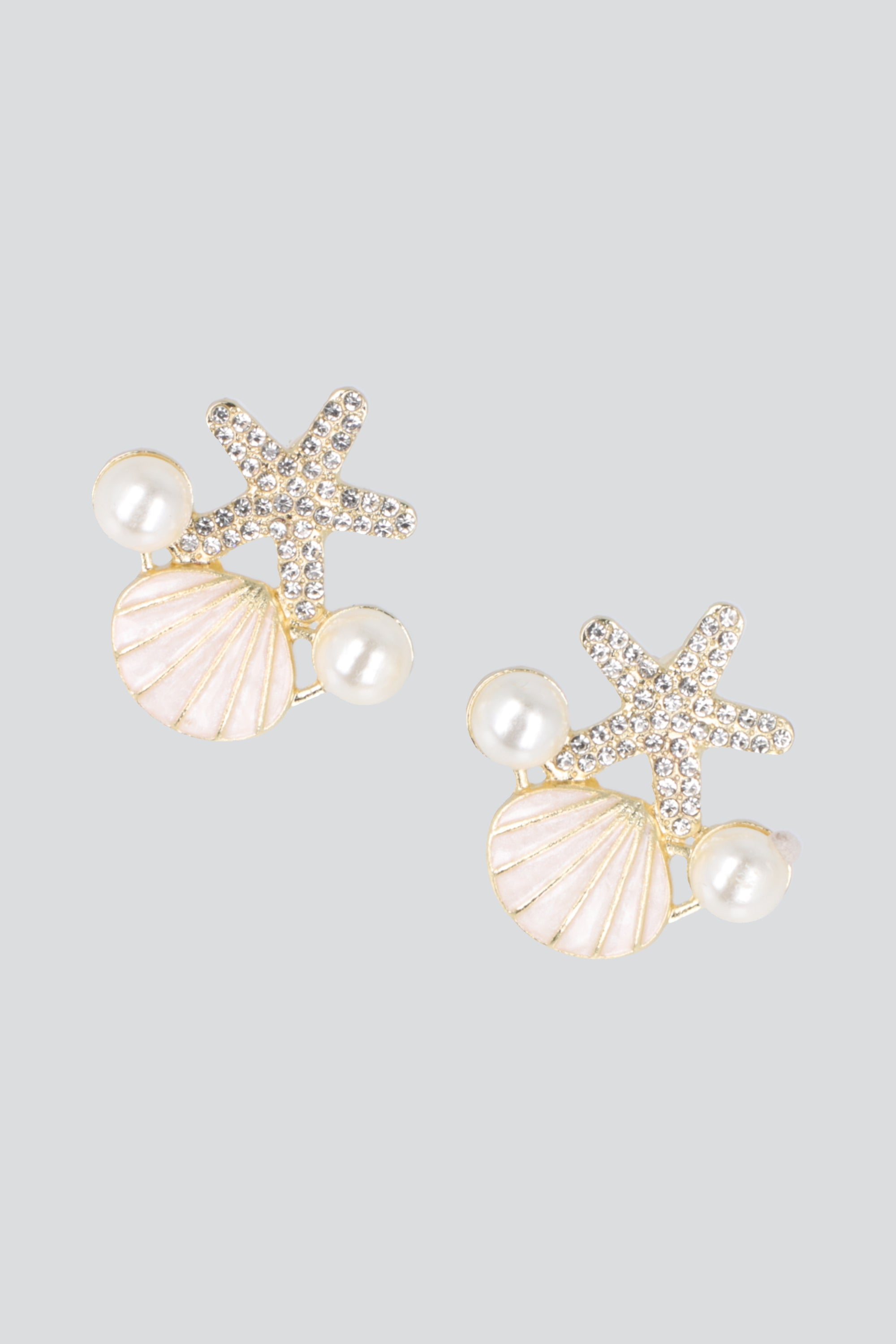Aretes estrella concha perlas