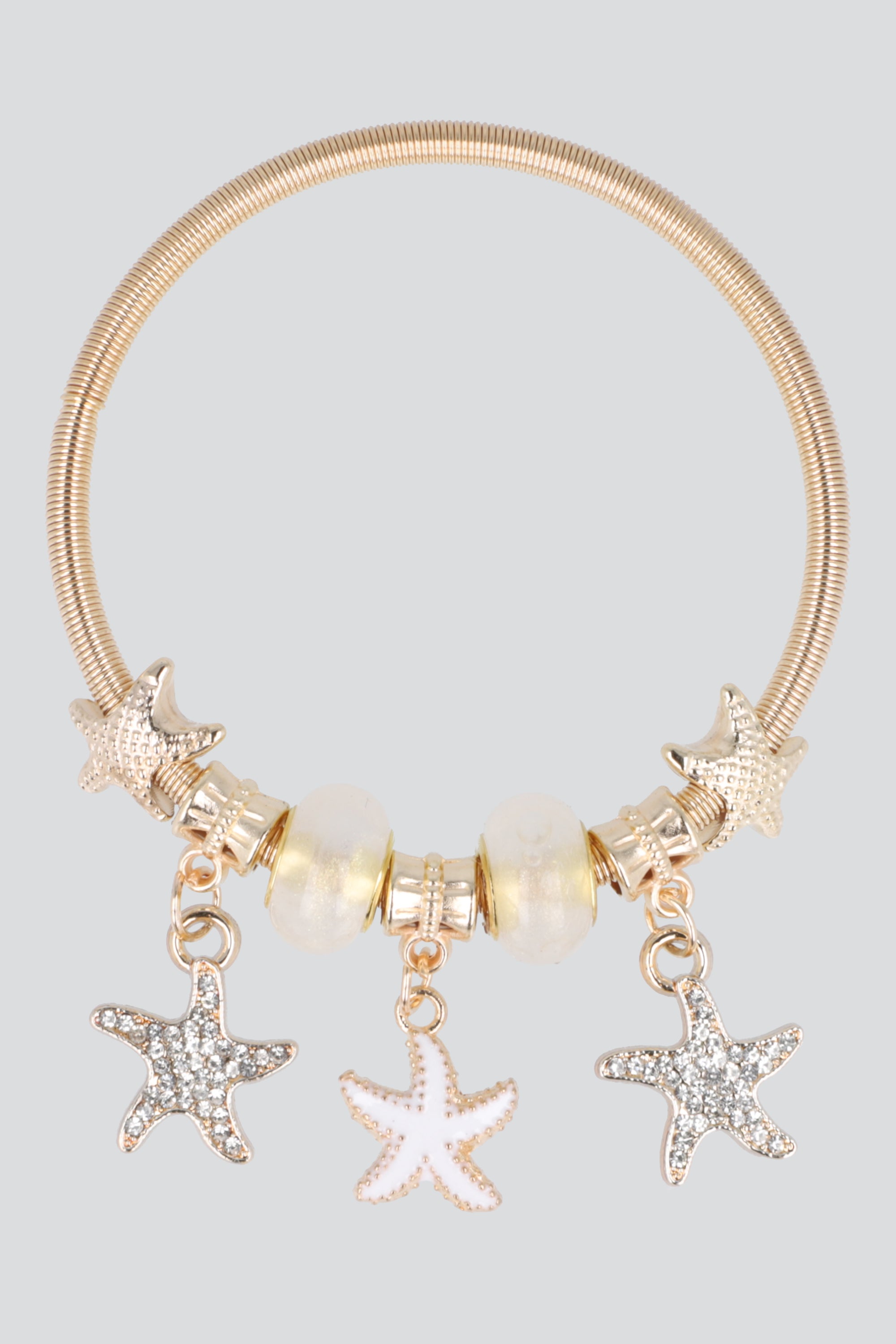 PULSERA RESORTE ESTRELLAS DE MAR ORO