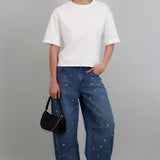 Jeans barrel con estoperoles metalicos
