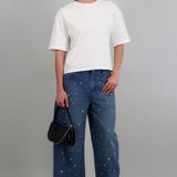 Jeans barrel con estoperoles metalicos