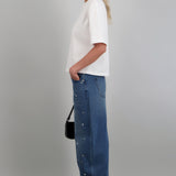 Jeans barrel con estoperoles metalicos