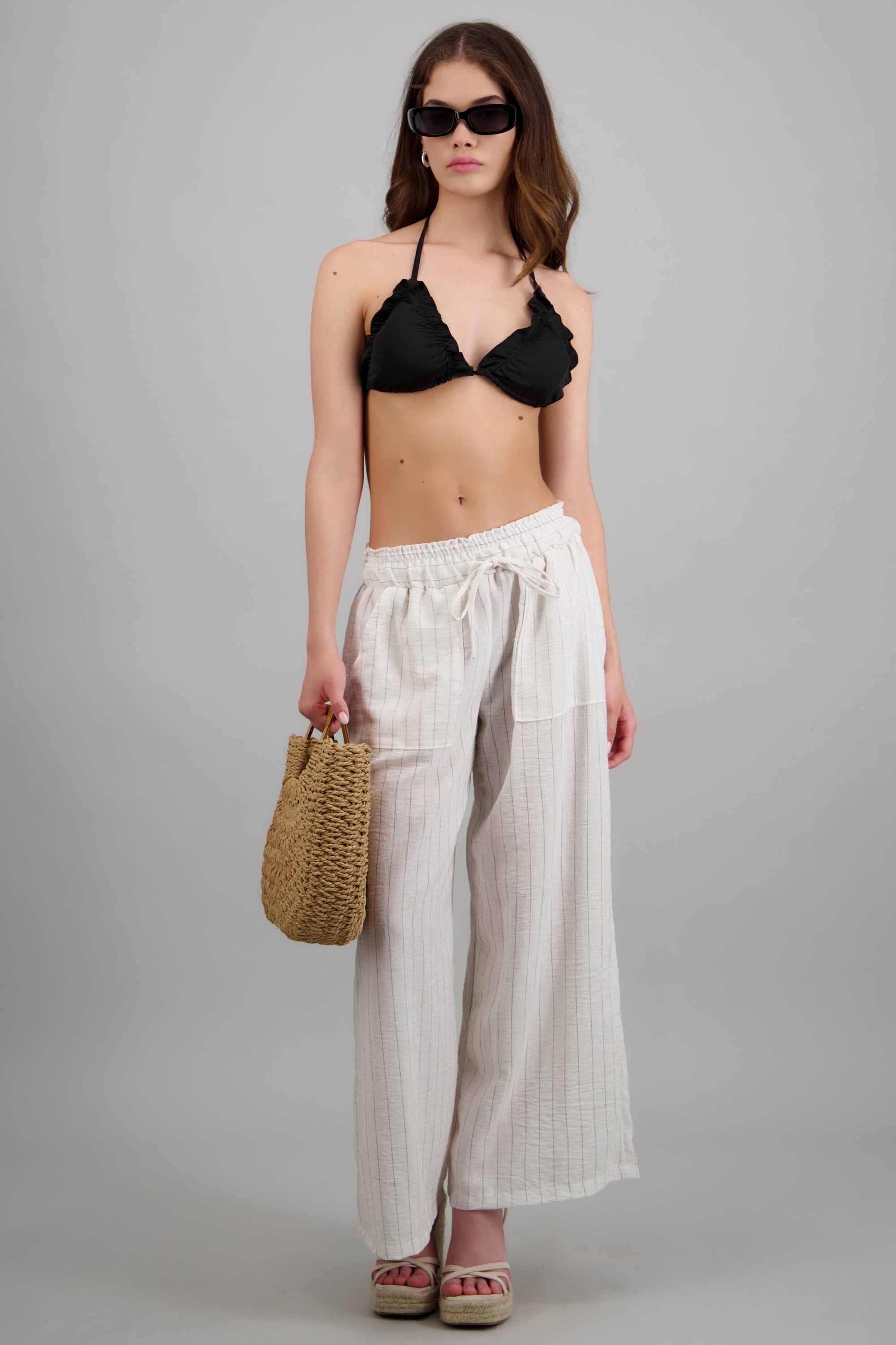 Pantalon lineas con bolsas ARENA