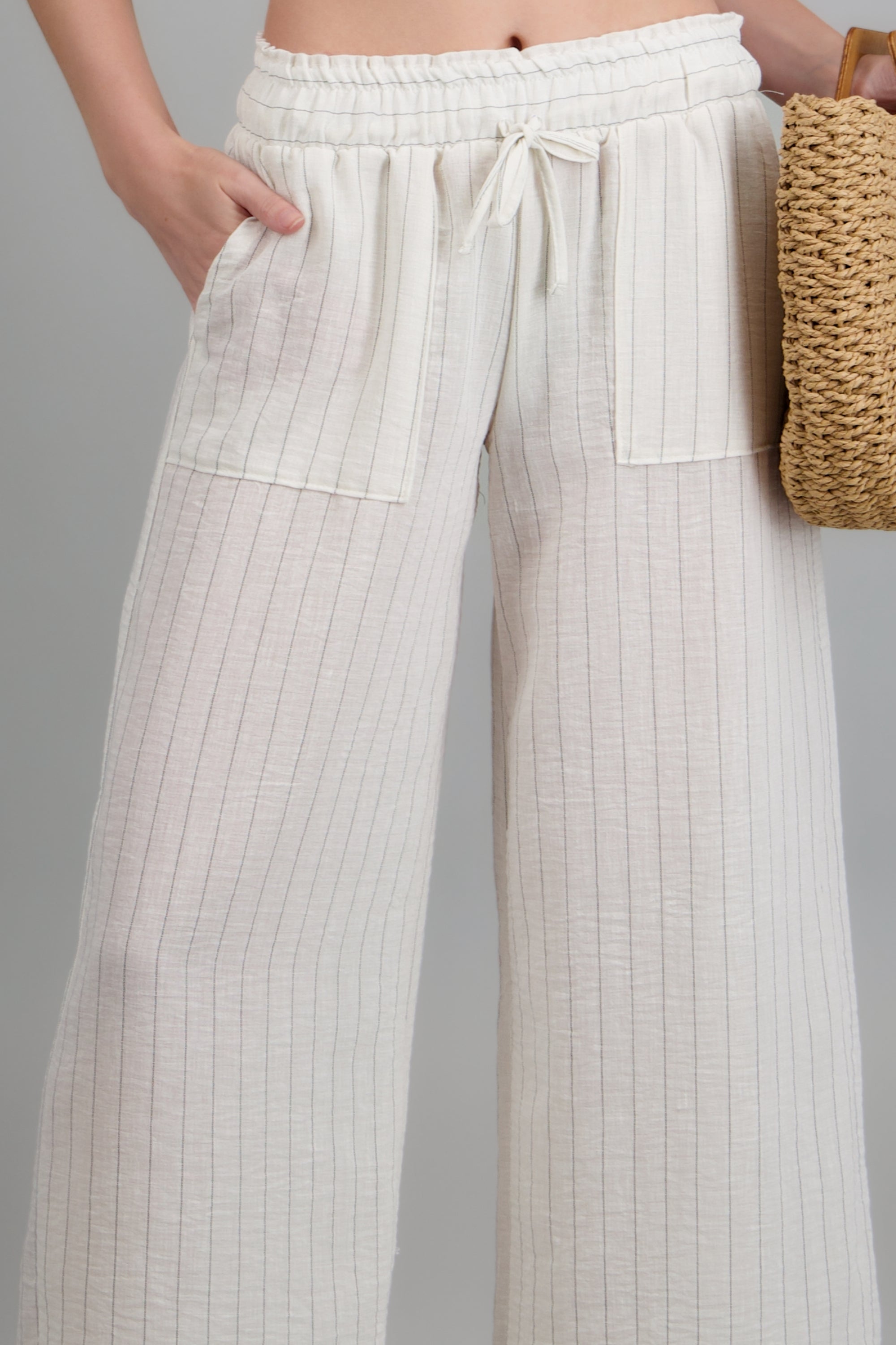 Pantalon lineas con bolsas BLANCO COMBO