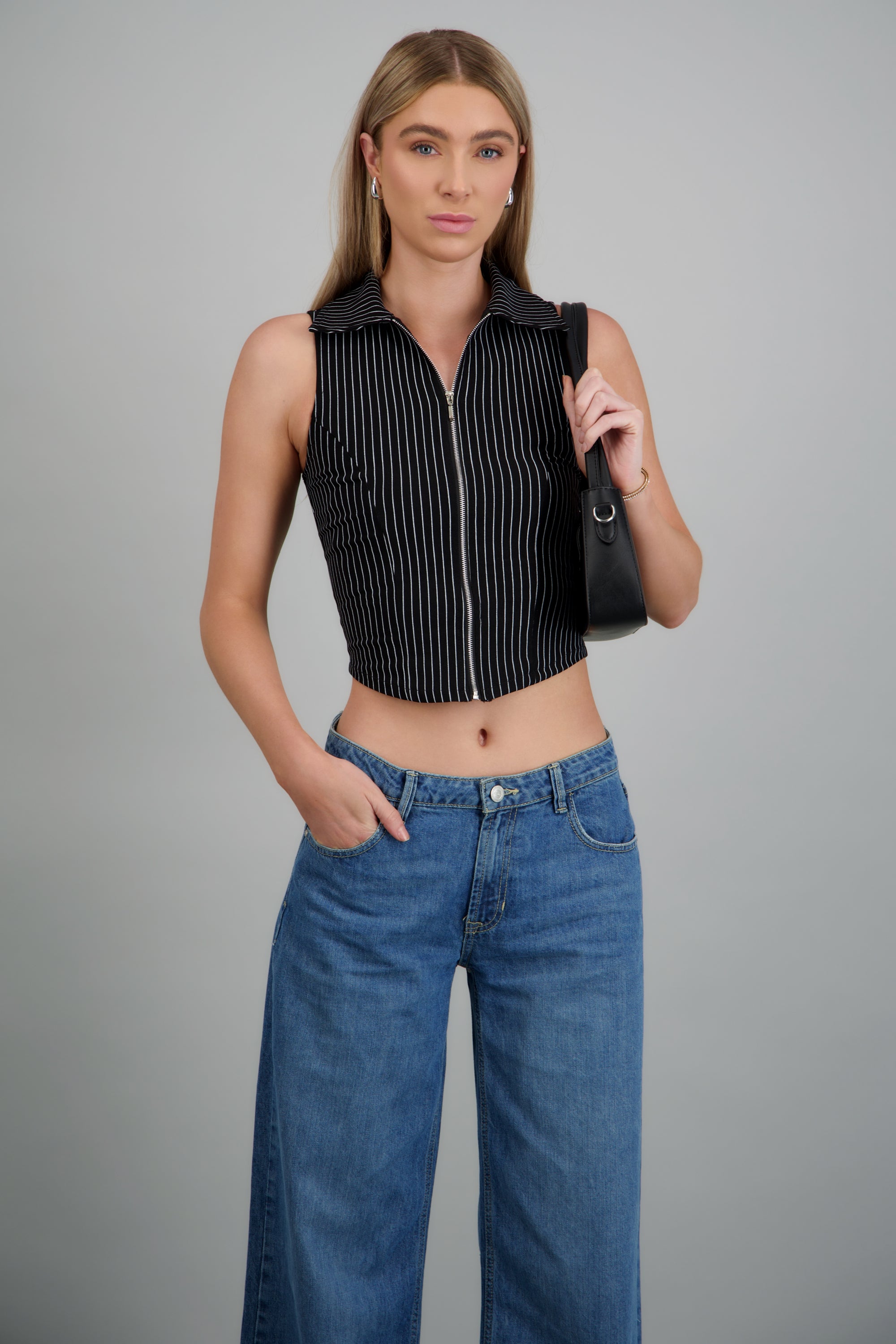 Top sin mangas cuello polo detalle cierre NEGRO COMBO