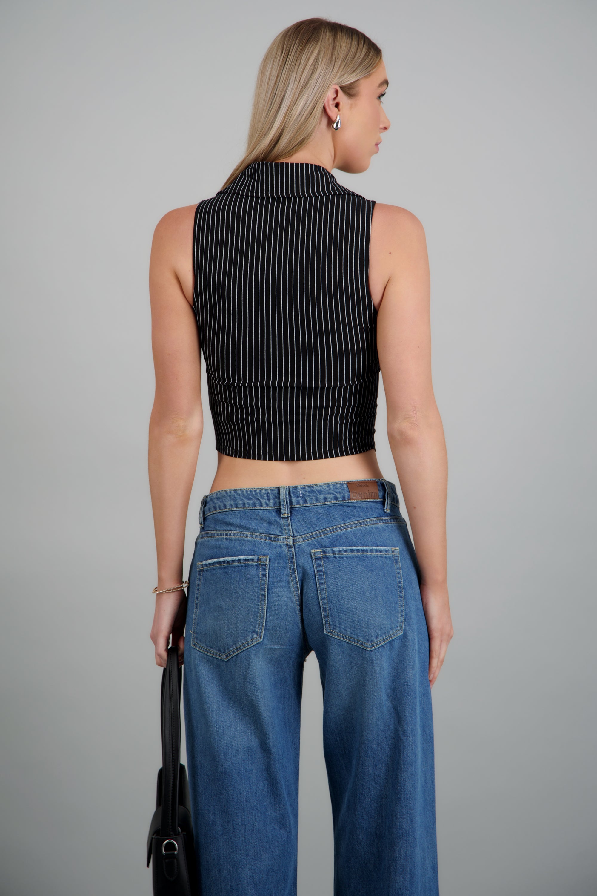 Top sin mangas cuello polo detalle cierre NEGRO COMBO