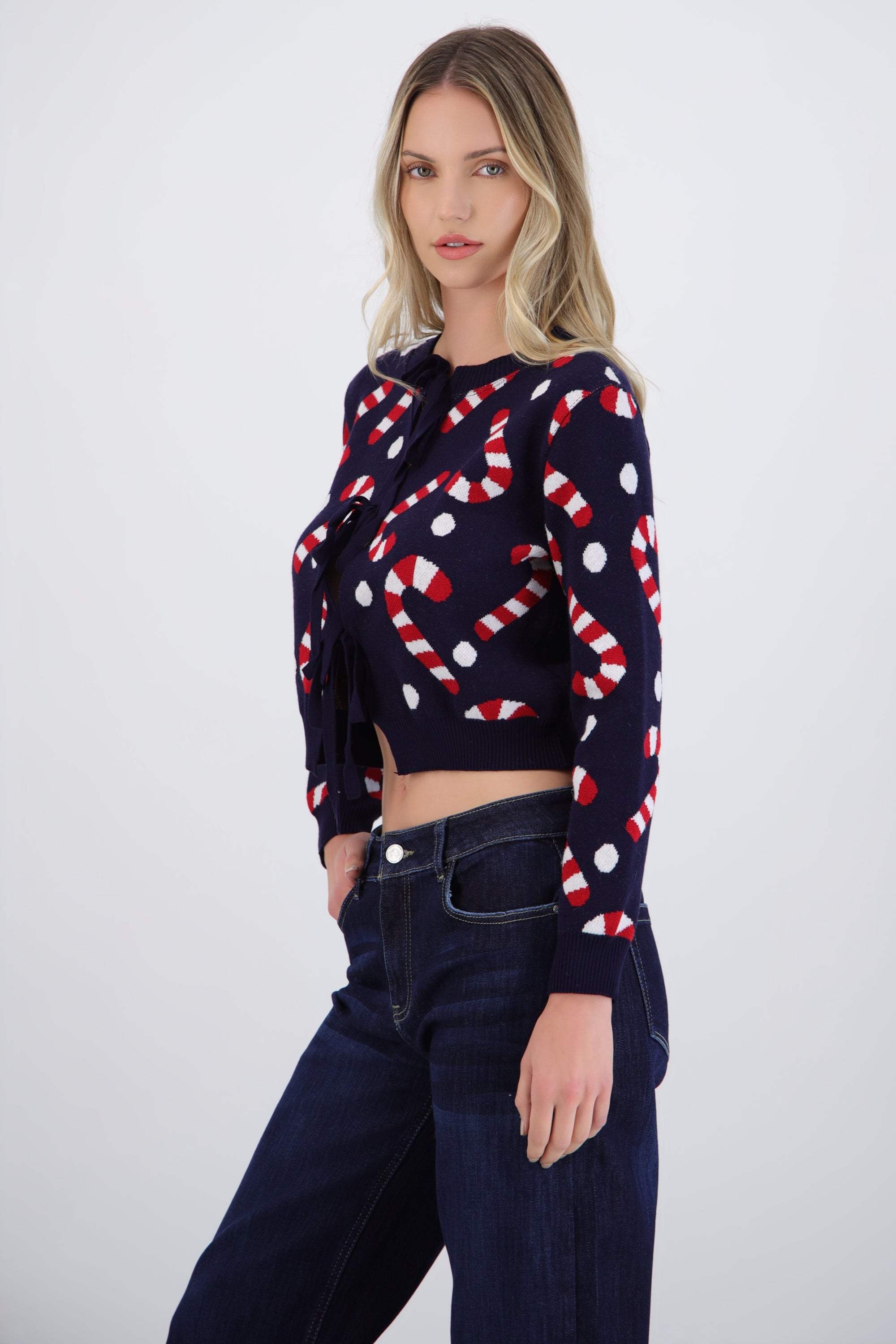 Cardigan candycanes detalle moños