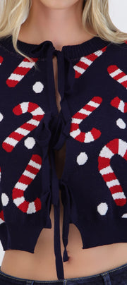 Cardigan candycanes detalle moños