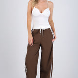Pantalones pretina contraste con rayas al costado