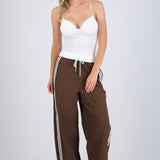 Pantalones pretina contraste con rayas al costado